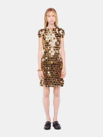 De iconische gouden Sparkle disc-jurk