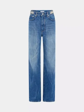 Kenmerkende jeans met metalen schijfjes uit 1969