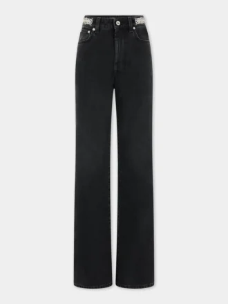 Kenmerkende zwarte jeans met schijfjes uit 1969